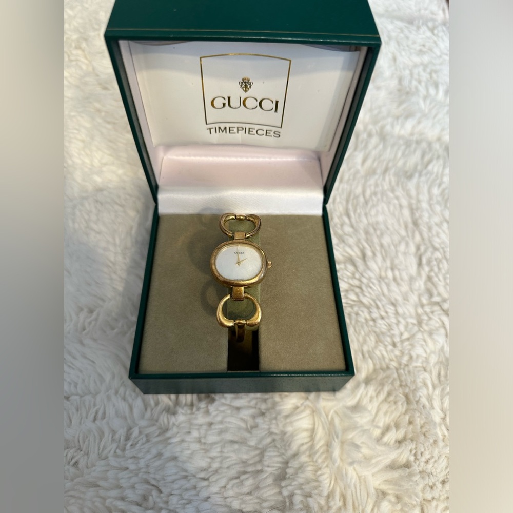 Vintage Gucci seashell dial gold plated bangle watch